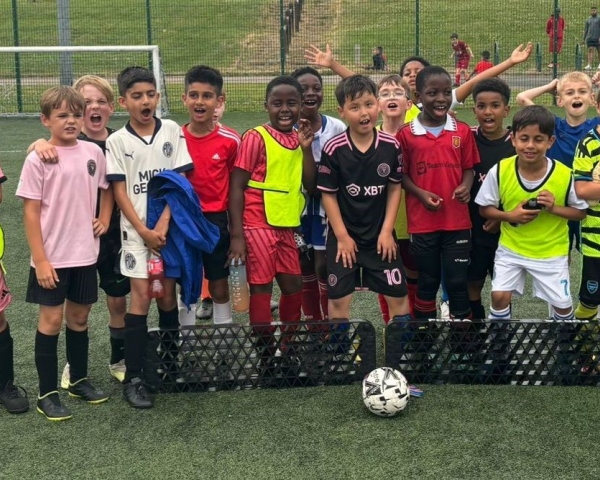 Children playing football.